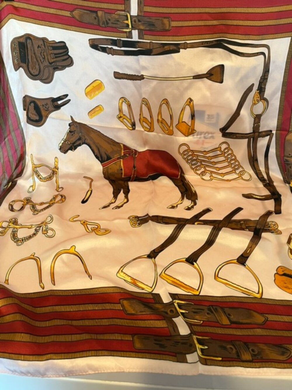 Equestrian print silk scarf.